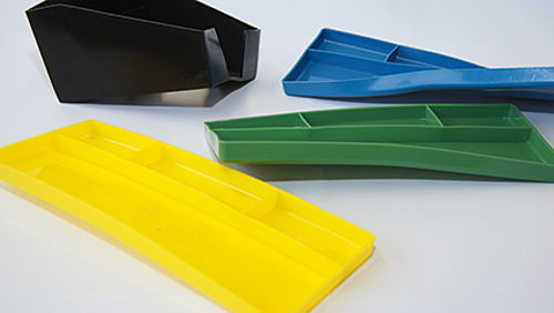 Injection molding defect example: Warping in a plastic part.