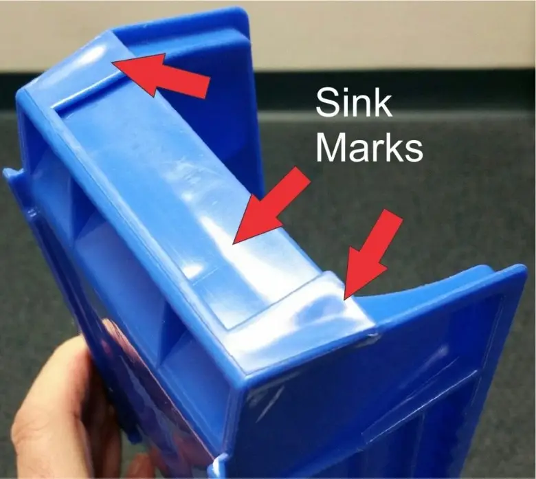 Injection molding defect example: Sink marks in a plastic part.